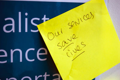 "Our services save lives." post it note written by a Women's Aid member at National Conference 2015.